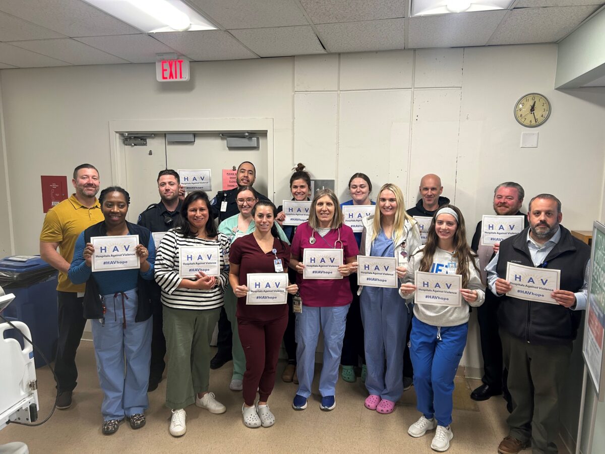 Healthcare team gathers for a group photo on HAVHope Friday